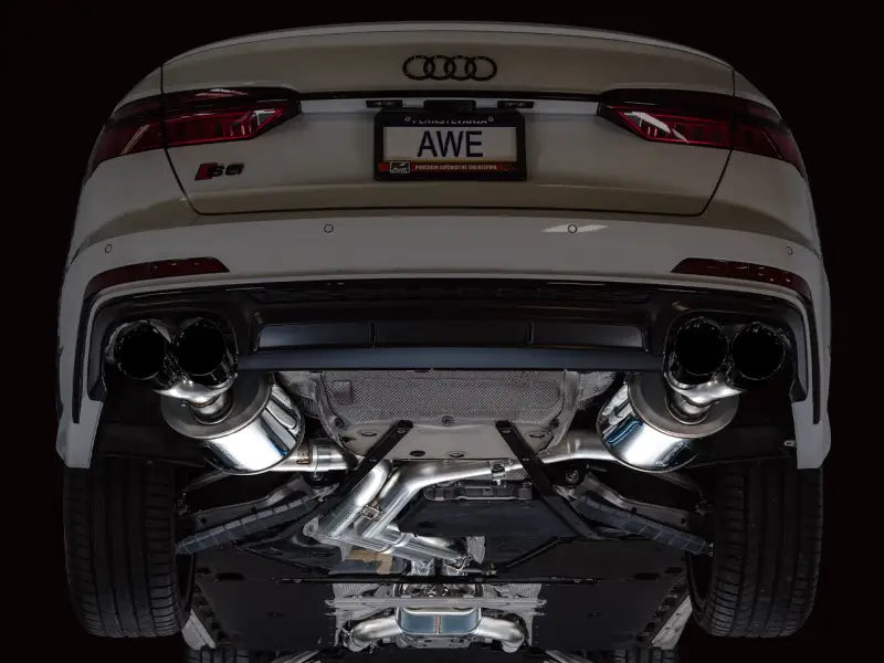 Car exhaust system showcasing AWE Tuning Touring Edition Exhaust with diamond black tips