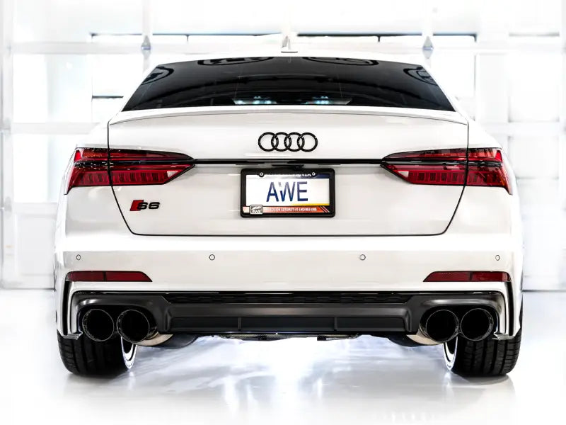 White Audi S5 with quad exhaust showcasing AWE Tuning track edition exhaust in Diamond Black