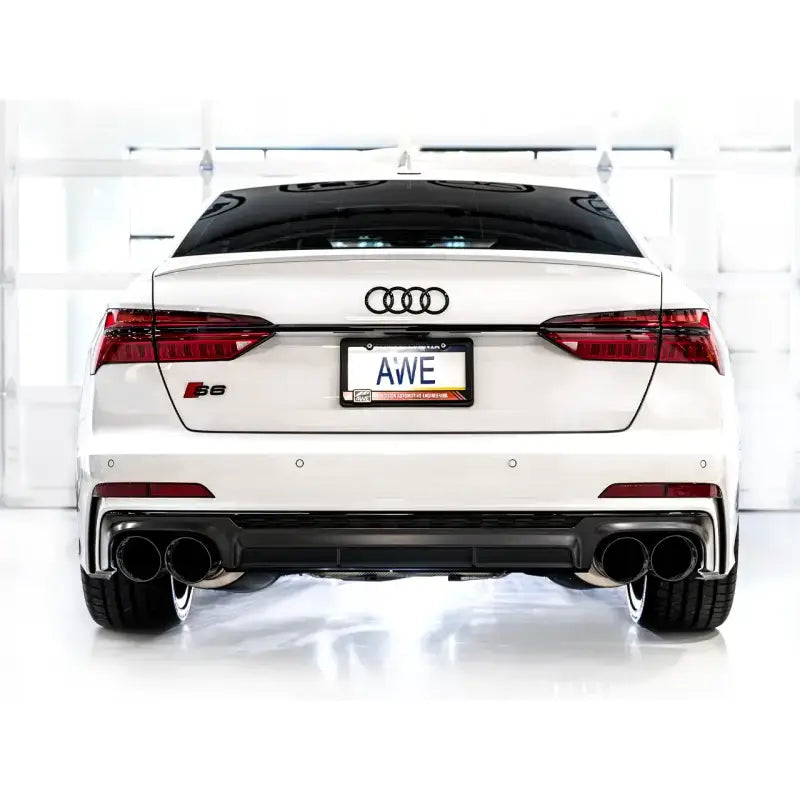White Audi S5 with quad exhaust showcasing AWE Tuning track edition exhaust in Diamond Black