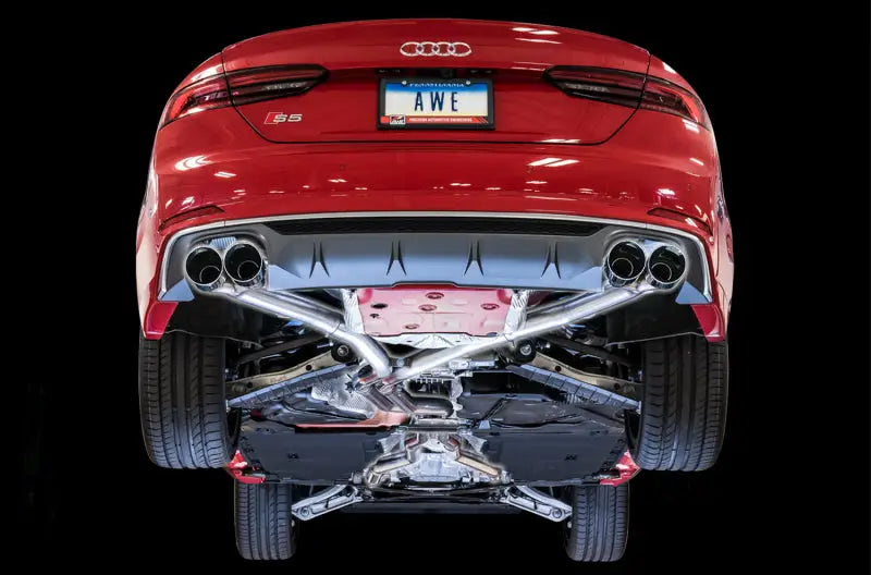 Red Audi S5 with aftermarket track edition exhaust and diamond black tips