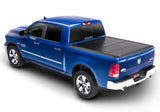 Blue Ram pickup truck with tonneau cover in 8ft bed for Dodge Ram trucks