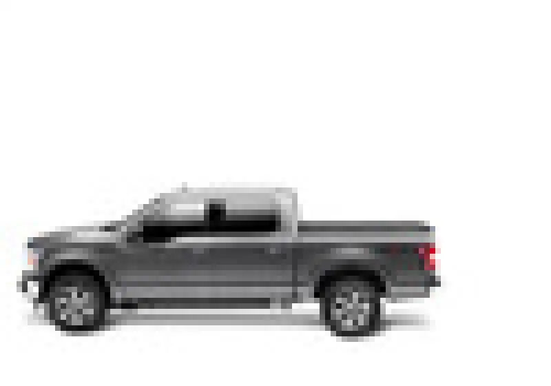 Side view of a gray 2021 Ford F-150 with BAKFlip MX4 6.5ft bed cover in matte finish.