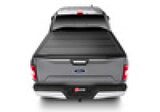 2021 Ford F-150 with BAKFlip MX4 6.5ft matte finish bed cover installed, showcasing its sleek, low-profile design and durable aluminum panels.