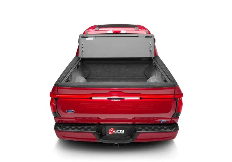 BAKFlip MX4 5.5ft Bed Cover with matte finish on 2021+ Ford F-150 Super Crew 4 Door shown open, showcasing robust aluminum panels and integrated tailgate seal, 67.1 Bed, Truck & Automotive, AVADA - Best Sellers