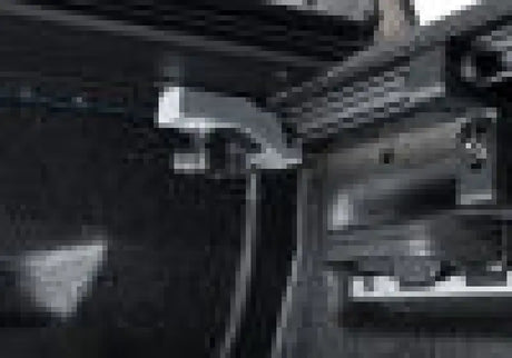 Close-up view of the innovative latch housing on the BAK 2022 Ford Maverick 4.5ft BAKFlip MX4 truck bed cover, featuring heavy-duty aluminum matte finish panels.