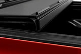 Close-up of the BAKFlip MX4 Bed Cover on a 2022+ Toyota Tundra 5.5ft bed, showing the heavy-duty aluminum matte finish panels in a sleek, low-profile design.