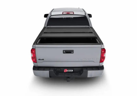 BAK 2022+ Toyota Tundra 5.5ft Bed BAKFlip MX4 Bed Cover with heavy-duty aluminum matte finish, premium density foam core, and integrated tailgate seal.