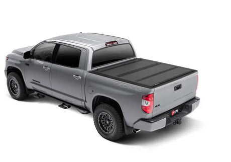 BAK 2022+ Toyota Tundra 5.5ft Bed BAKFlip MX4 Bed Cover featuring heavy-duty aluminum matte finish, premium density foam core, and integrated tailgate seal.