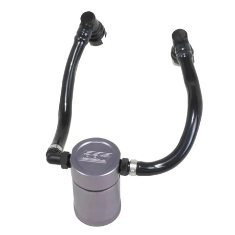 Gray oil separator can with black hoses from BBK Ford Mustang GT separator kit