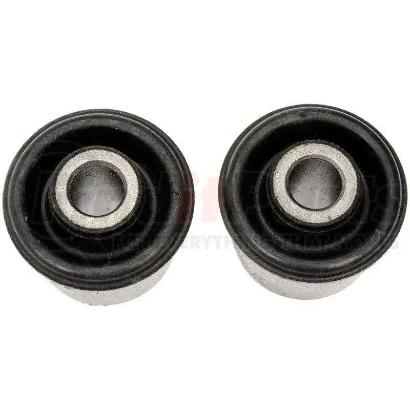 Two black rubber BC69116 Dorman Bushing with metal centers for auto repairs