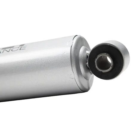 Silver shock absorber with black bushing for street performance on classic 4WD RAM 1500