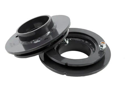 Gray metal suspension lift spacers for Rear Drop Pro Coil Spring Set on Ram 1500