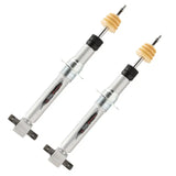 Two silver shock absorbers from the Belltech 2021+ Chevrolet Tahoe complete leveling kit