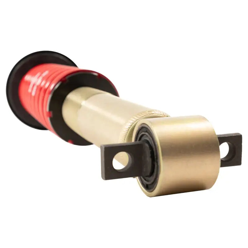 Gold-colored suspension coilover with red spring for Ford F-150 leveling coilover kit