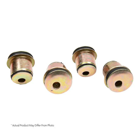 Gold-colored metal bushings with black rubber rings for Belltech Alignment Kit Dodge Ram