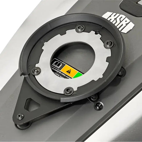 Black and silver BF24 Tanklock Mount with warning label for tanklock bag mounting hardware