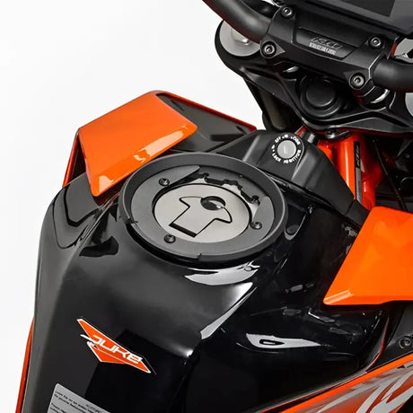 Black and orange motorcycle fuel tank with fuel cap and ignition switch for Tanklock Bag mounting