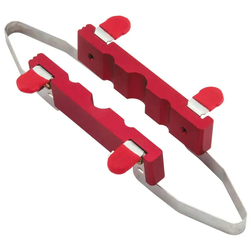 Red and silver metal clamp on bikemaster aluminum vise insert for bike repairs