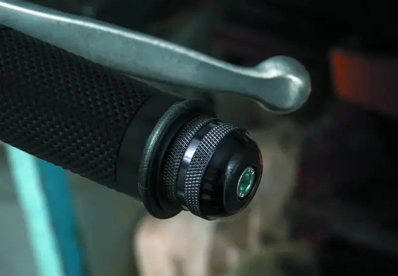 Motorcycle handlebar grip with BikeMaster Anti-Vibration Bar Ends for smoother ride