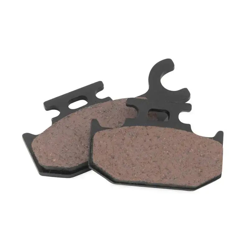 Two brown BikeMaster Can-Am brake pads with black metal backing for can-am brakes