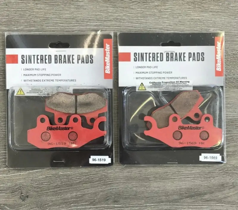 Two red BikeMaster sintered brake pads packaged for Can-Am bikes, durable brake pads
