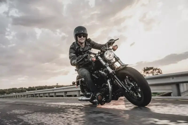 Motorcycle with rider using Bikemaster Flywheel Puller 38mm on bike engine