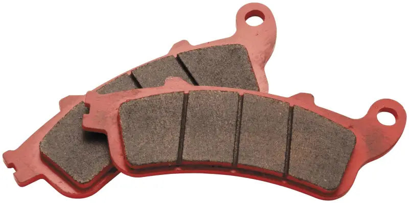 Red brake pads with friction material for BikeMaster Honda Sintered Brake Pads