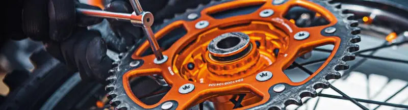 Orange and silver BikeMaster Kawasaki front sprocket for smooth power transfer on Kawasaki motorcycles