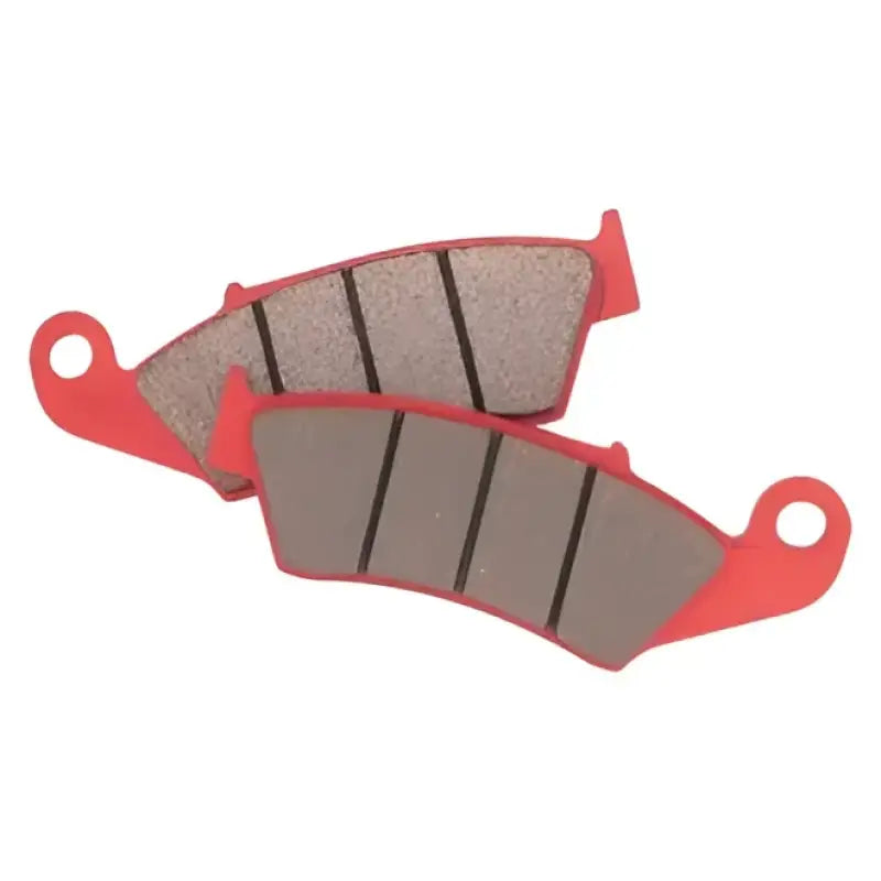 Red motorcycle brake pads for BikeMaster Kawasaki Sintered Brake Pads show high-quality sintered brake pads