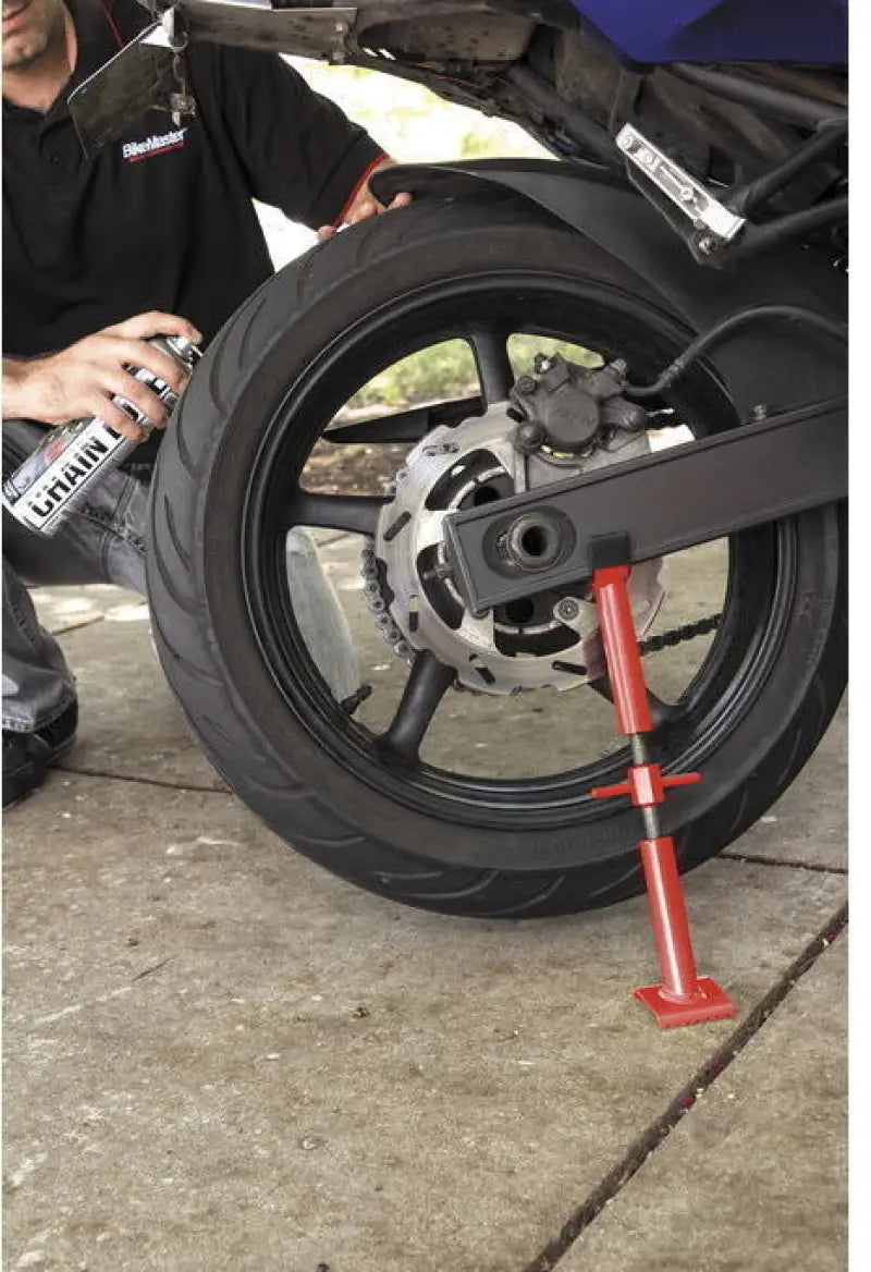 BikeMaster Liftstick red for motorcycle chain maintenance, durable compact design, best RV parts & accessories