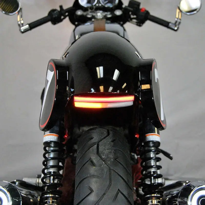 Rear view of black Moto Guzzi motorcycle with BikeMaster Moto Guzzi brake pads
