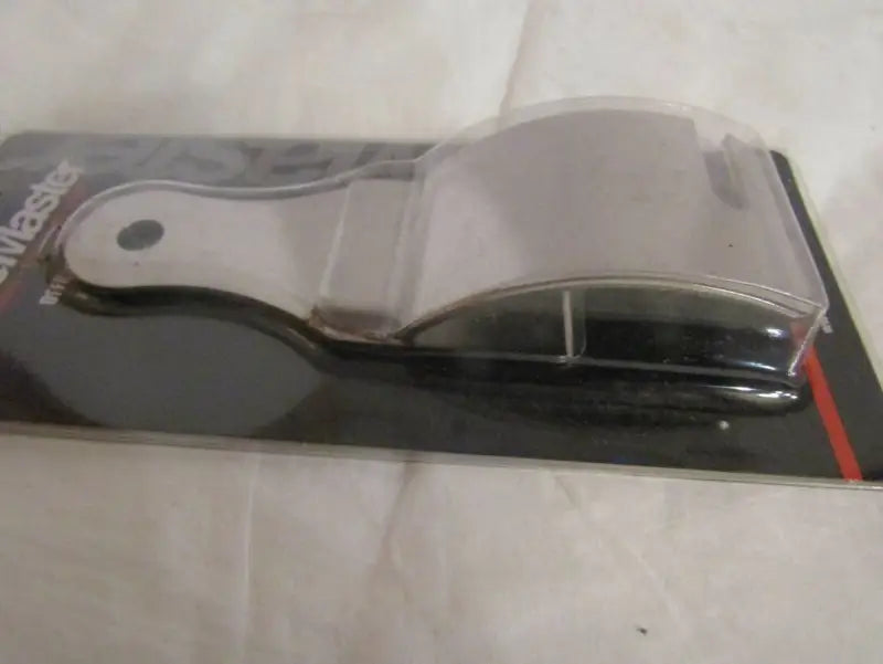 Stainless steel cheese slicer in packaging for BikeMaster Off Road Tire Tool road tire tool