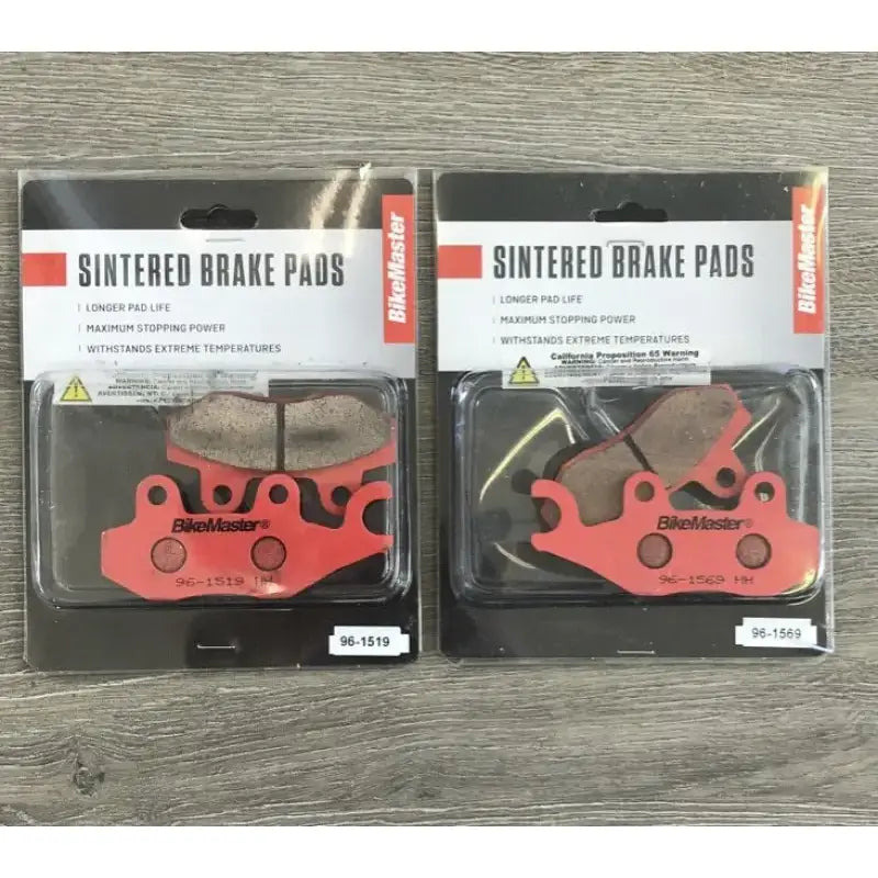 Two red BikeMaster sintered brake pads packaged for Can-Am bikes, durable brake pads