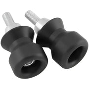 Black motorcycle swingarm spools from BikeMaster spool kit for easy track stand setup