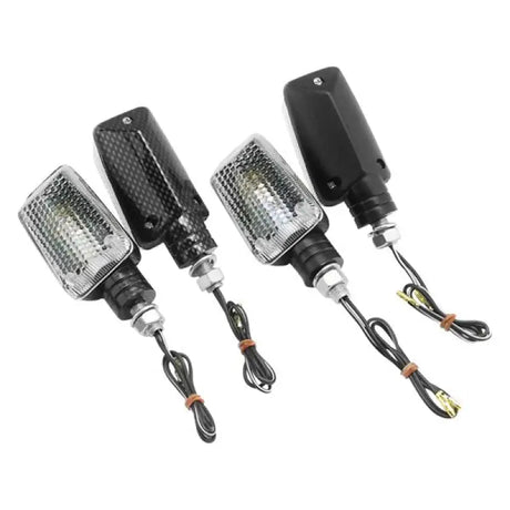 Four motorcycle marker lights on the BikeMaster Universal Ministalk Marker Light Carbon/Clear
