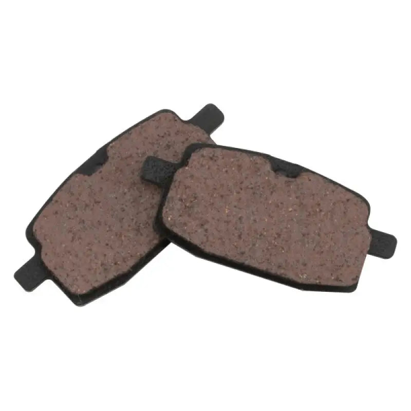 Two brown BikeMaster Yamaha brake pads for Yamaha brake systems in a bike upgrade