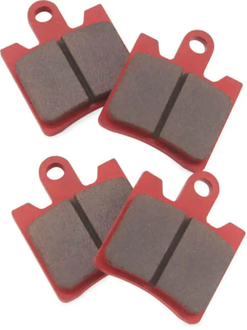 Four red and brown BikeMaster Yamaha Sintered Brake Pads for bike braking power