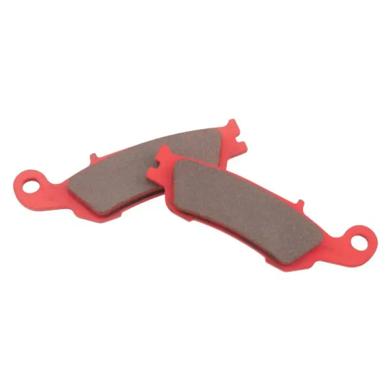 Two red and gray BikeMaster Yamaha Sintered Brake Pads for durable brake performance