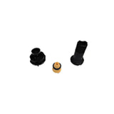 Assorted black and tan plastic parts for Bilstein B1 MB E-Class shock mounting kit