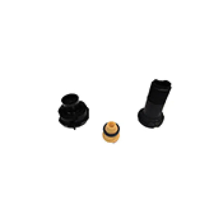 Assorted black and tan plastic parts for Bilstein B1 MB E-Class shock mounting kit