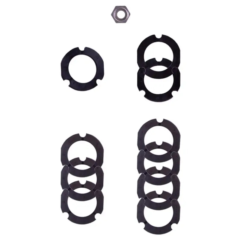 Assorted black washers and a nut for Bilstein B1 MB E-Class shock mounting kit