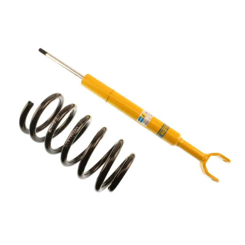 Yellow shock absorber and black coil spring from Bilstein B12 suspension kit for Audi A6 Quattro