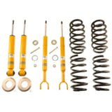 Yellow suspension components and black coil springs in Bilstein B12 suspension kit for Audi A6 Quattro
