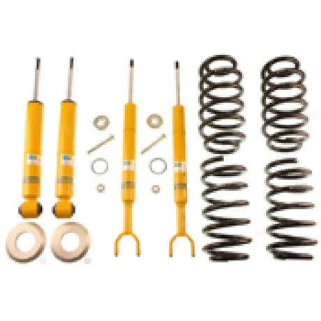 Yellow suspension components and black coil springs in Bilstein B12 suspension kit for Audi A6 Quattro