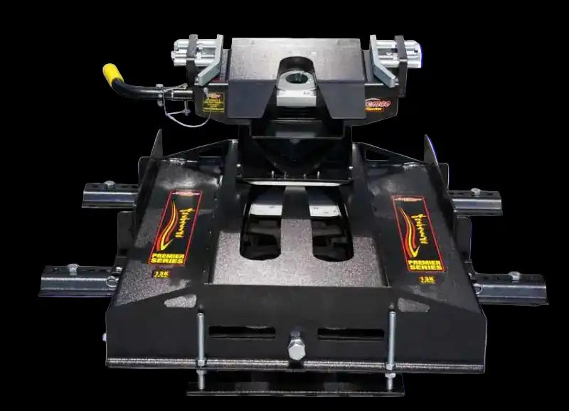 Black metal hitch receiver with yellow handle and red accents, designed for towing vehicles.