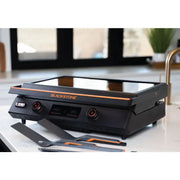 Cook indoors or outdoors with the 8001 Blackstone E-Series 22' Electric Tabletop Griddle's ceramic titanium surface.