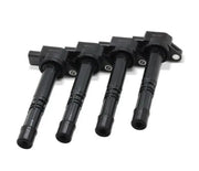 Four black ignition coils from BLOX Honda K-Series Coil Pack Set for Honda K-Series engines