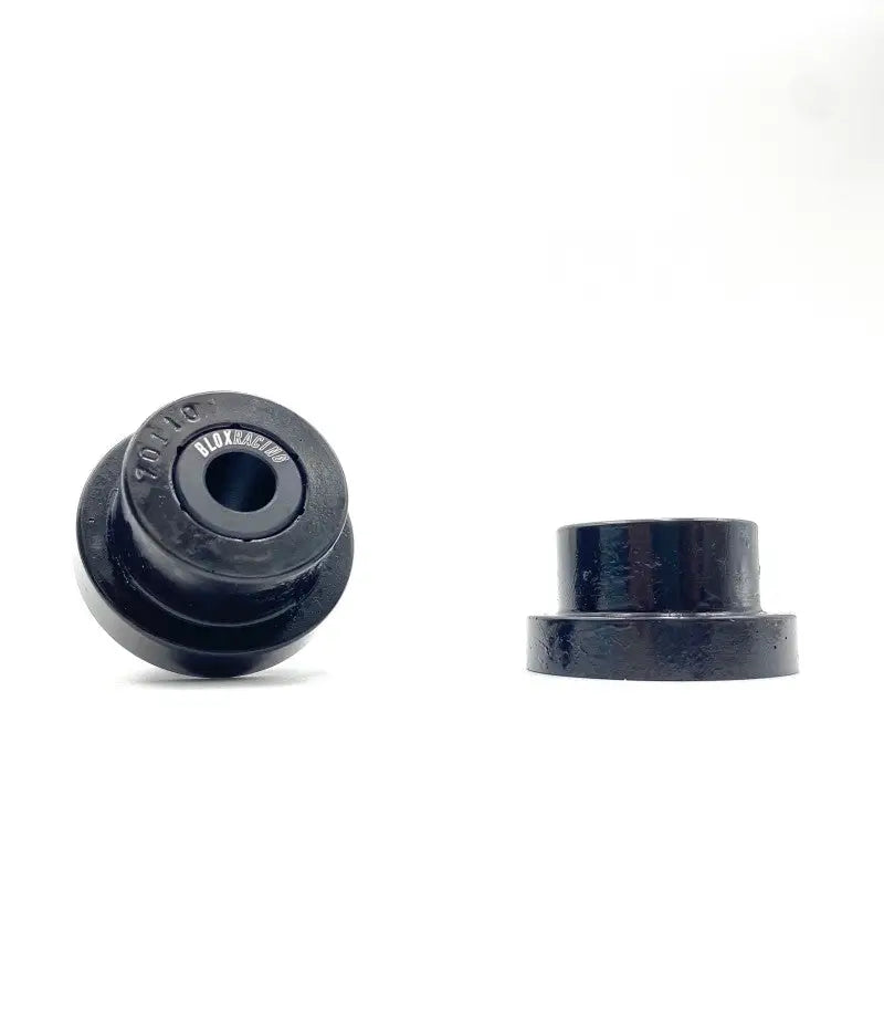 Two black BLOX Racing Replacement polyurethane bushings for EG/DC EK vehicles