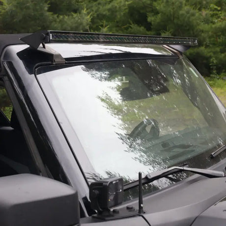 Black off-road vehicle with Borne Off-Road Light Bar Single Row Straight 10in