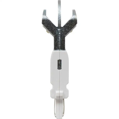 White and silver staple remover next to Brake Light Bulb LED 3057 for brake light repair